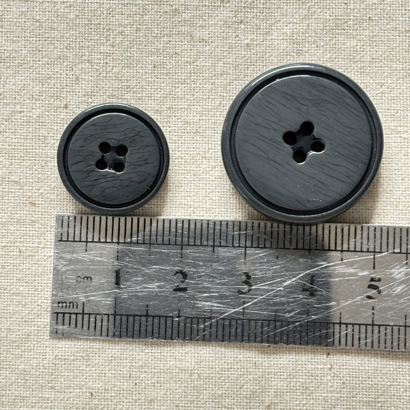 Bouton rond en résine noir 18mm/25mm - - 1 pièce